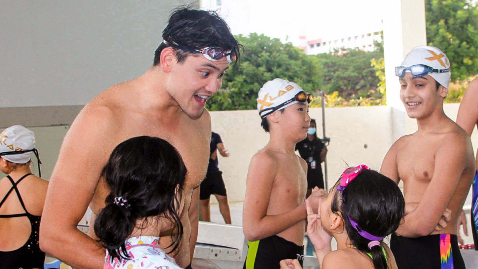 Joseph Schooling Excitedly Talking to Kids at The Swim Lab