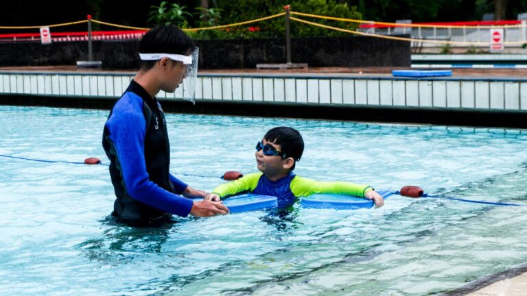The Swim Lab Coach Conducting a Swimming Lesson