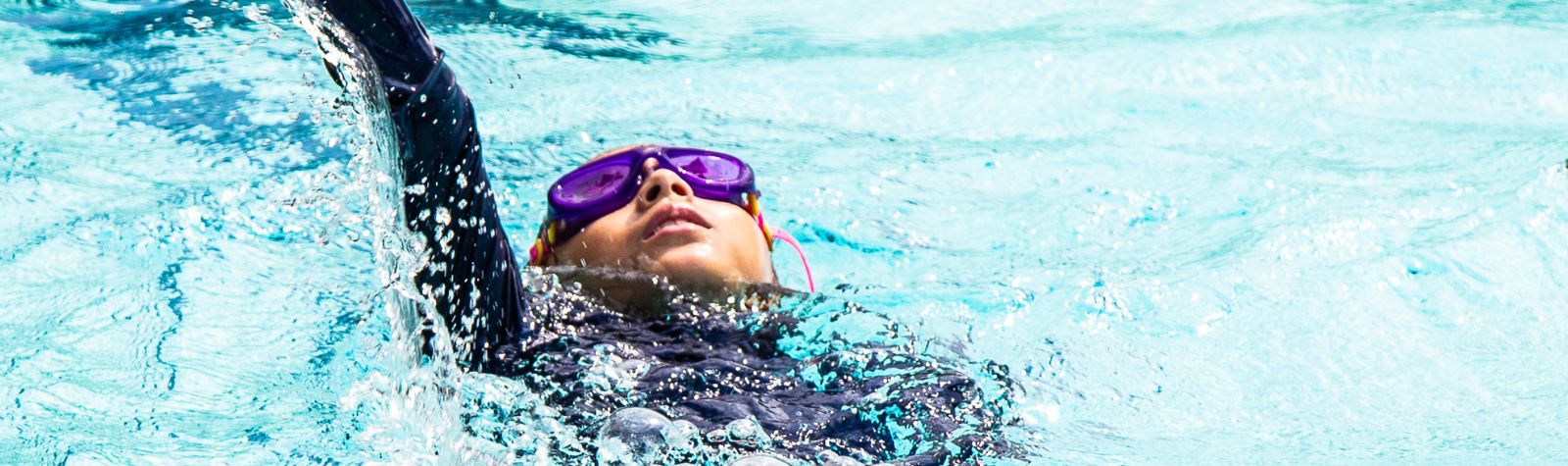 Child Doing BackStroke at The Swim Lab