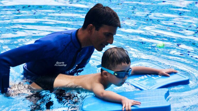 A Kid Learning to Swim at The Swim Lab