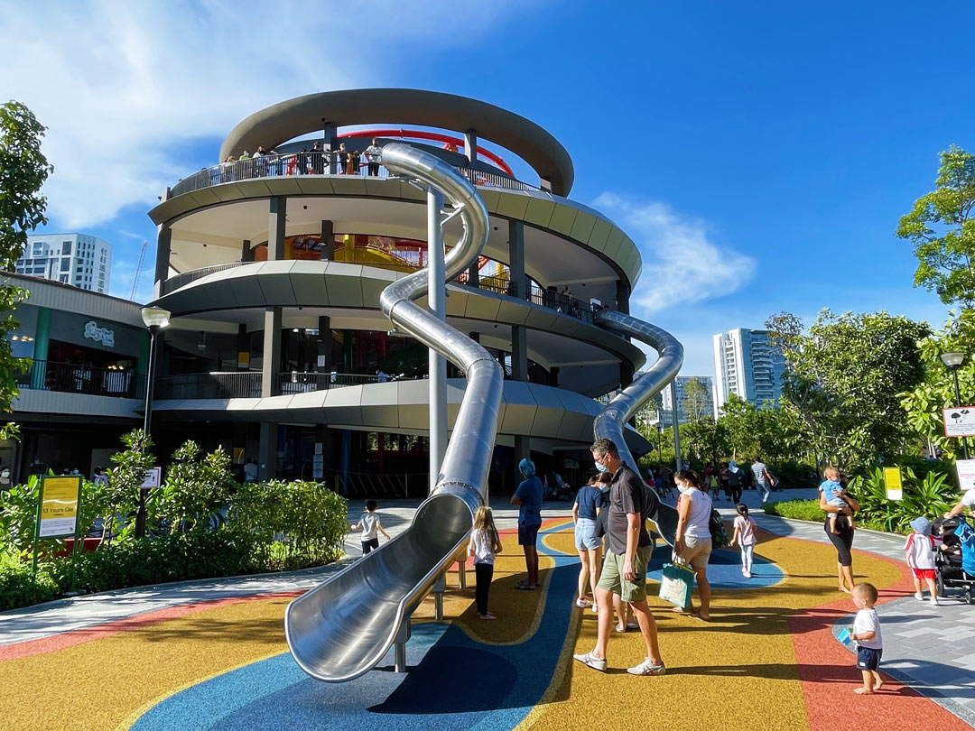 Kids splashing and playing at the Water Play area in Coastal PlayGrove, East Coast Park.